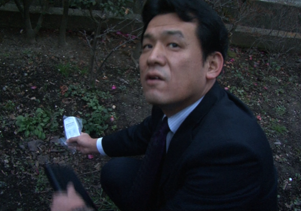 Yoshihiro Kanno of “Save Watari Kids” checks radiation levels in his neighborhood. | 2012